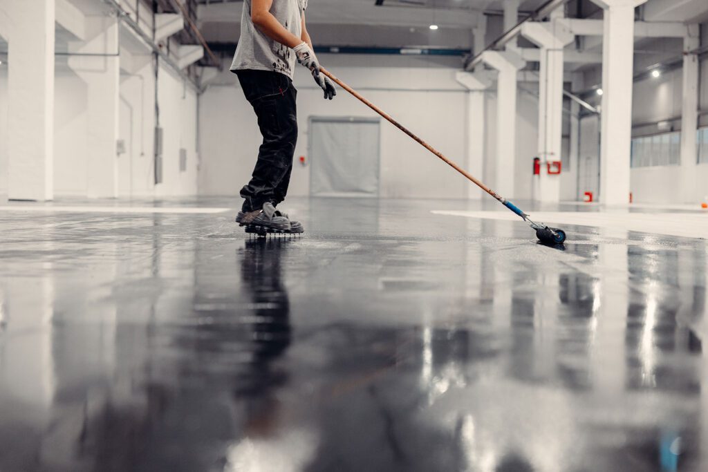 Black epoxy resin in a large garage space